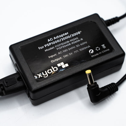 PSP charger adapter front view with US two prong plug
